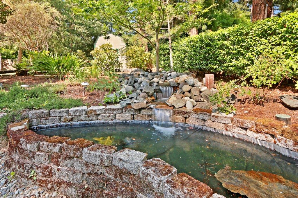 Pond and Waterfall - 6703 79th St W