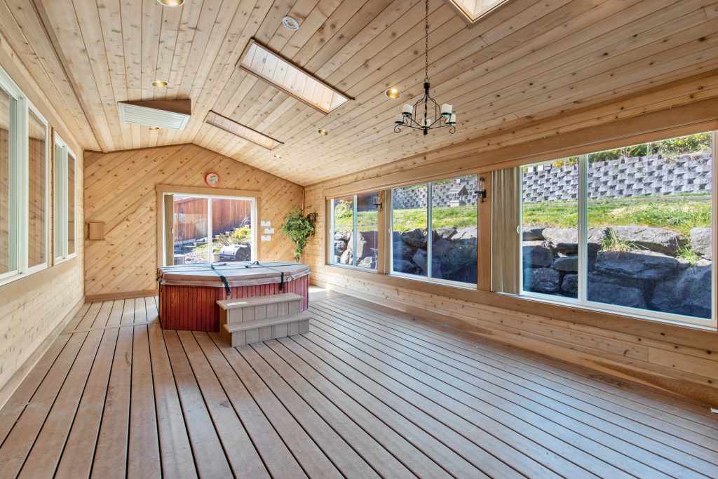 Welcome to the PERFECT entertainment space! This 300 sq. ft. cedar-lined sunroom addition is not included in the sq. ft. of the home. 
