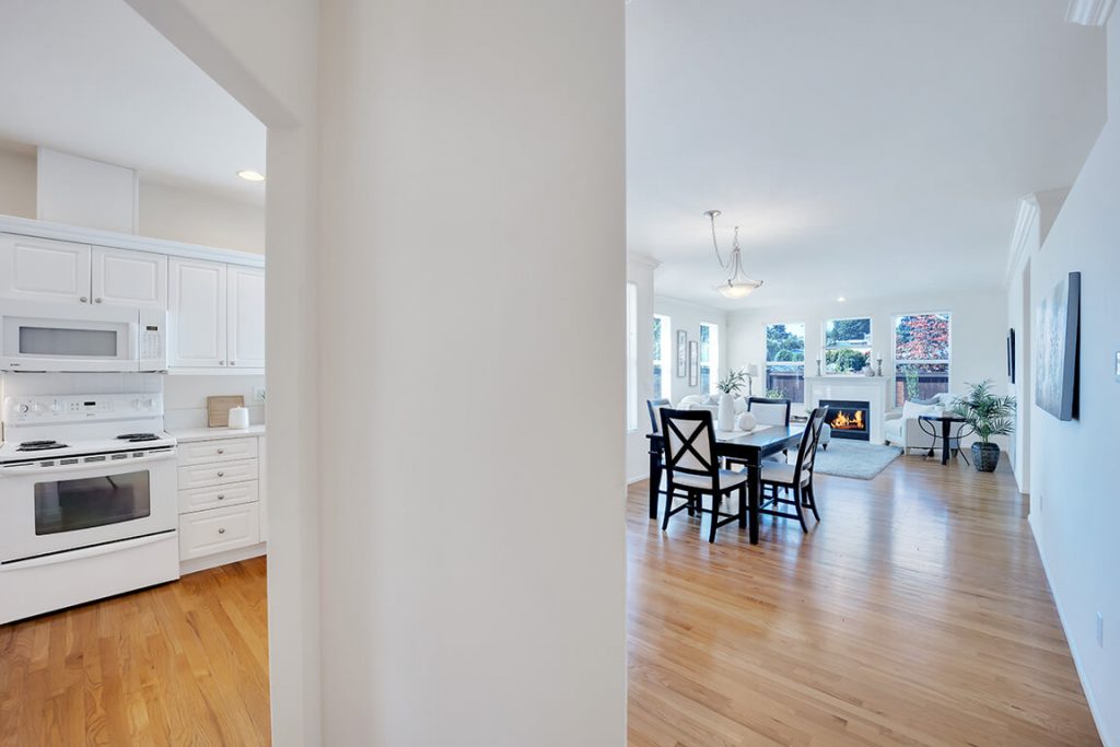 Step inside and you will notice the gleaming hardwood floors, the flood of natural light and the crisp, white crown molding and baseboard trim.