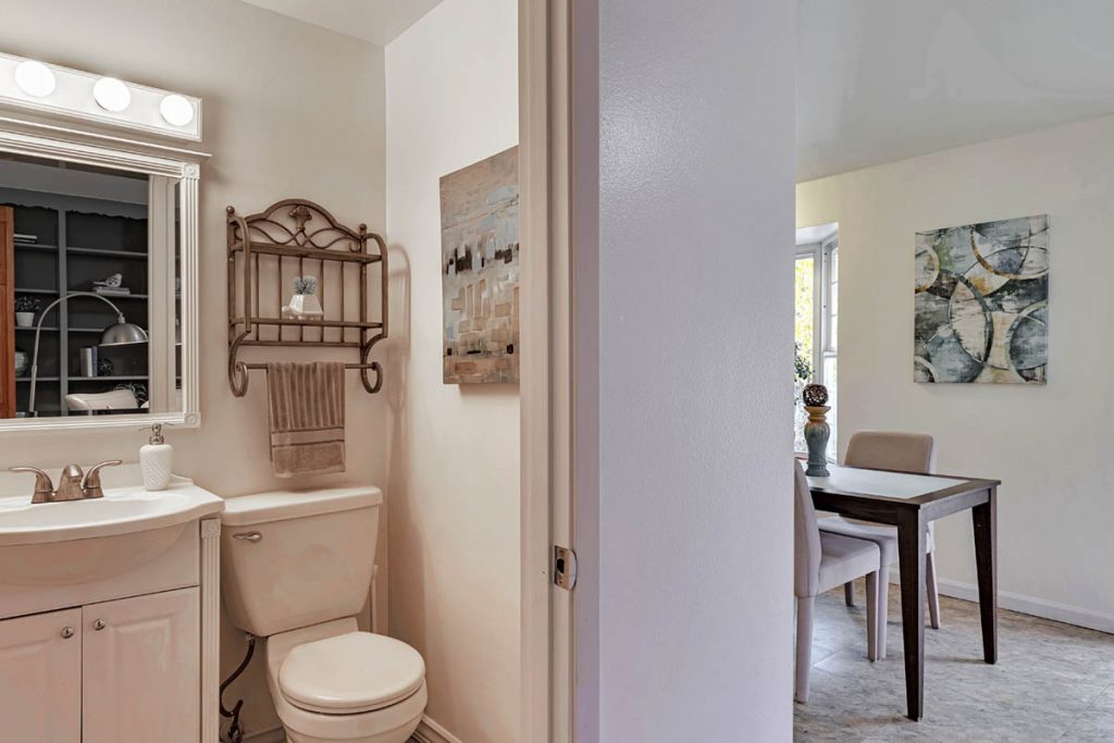 The powder room is located just off the family room.