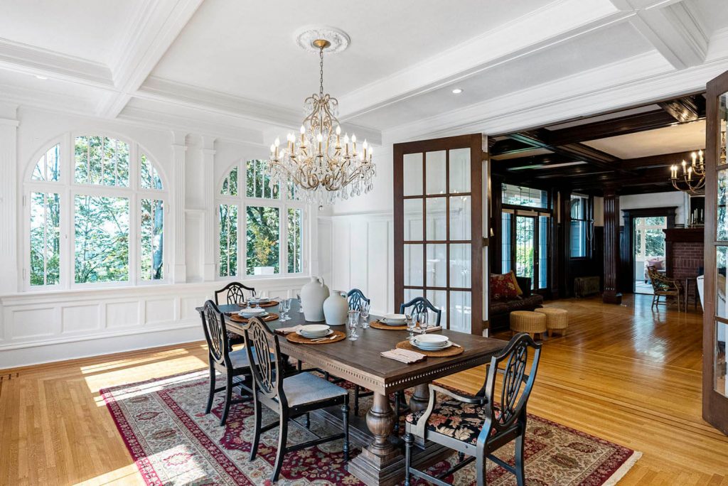Gracious formal dining room with box beam ceiling