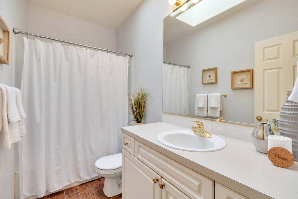 And the elegant full guest bathroom also features a wonderful skylight.