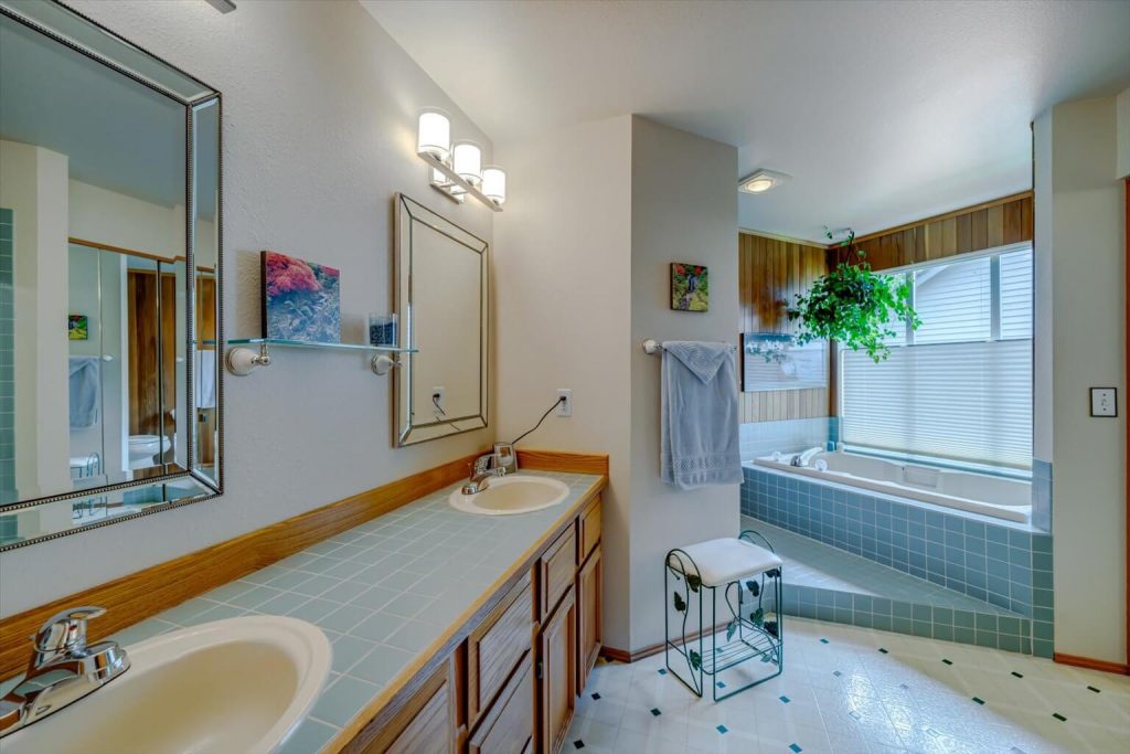 The 5-piece bath features dual vanities, a large soaking tub, a generous-sized walk-in closet and a walk-in shower.